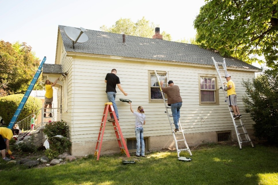people painting the house